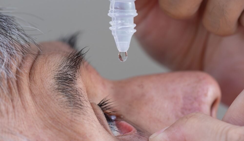 Beautiful young couple looking behind at you